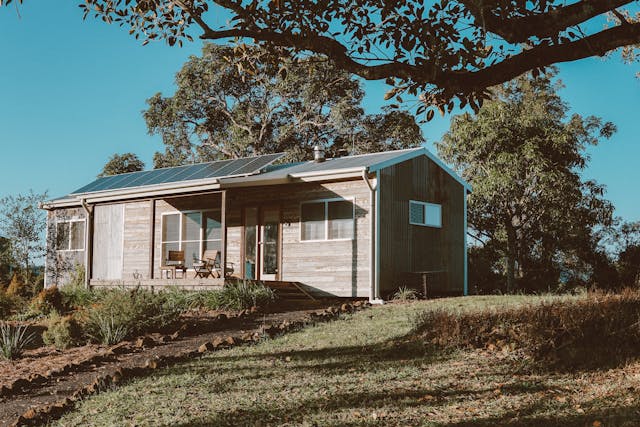 A house with solar panel connection on the roof.