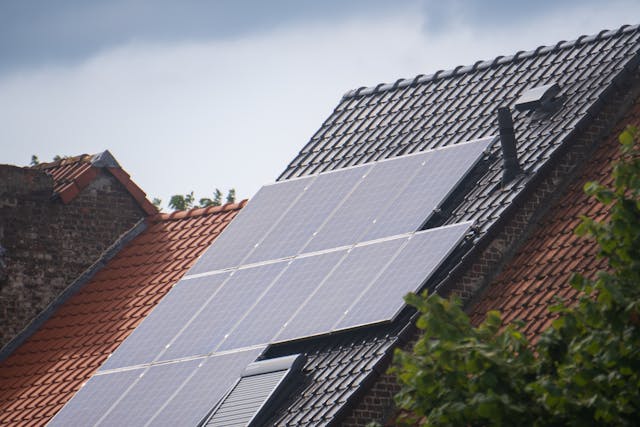 solar panel connection on rooftop of a house.